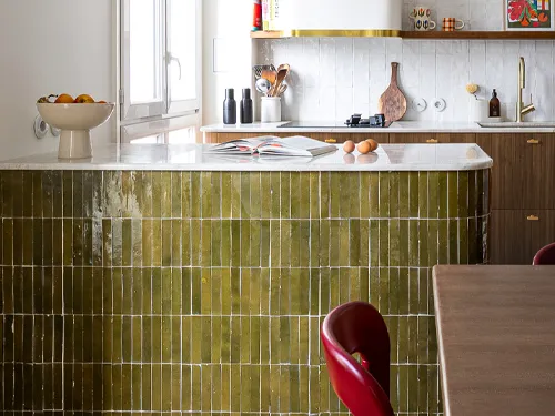 Green rectangular tiles on kitchen island